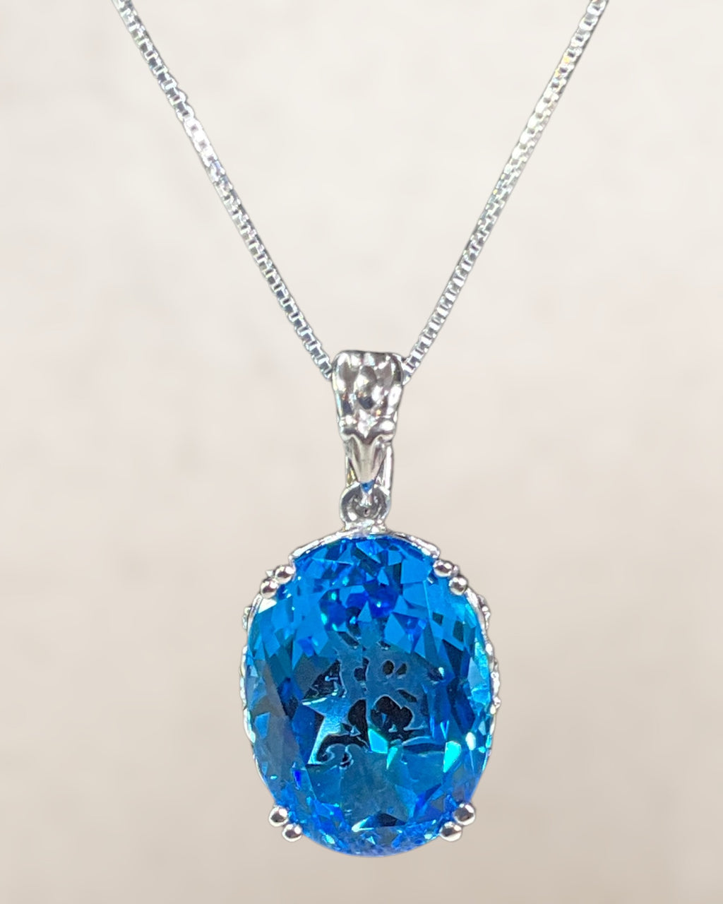 Sterling Silver Blue Topaz Pendant Necklace
