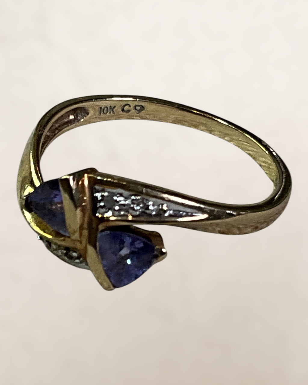 Vintage 10k Yellow Gold By Pass Ring Featuring Two Vibrant Trillion Cut Tanzanite and Channel set Diamonds - Estate sale (Great Condition)