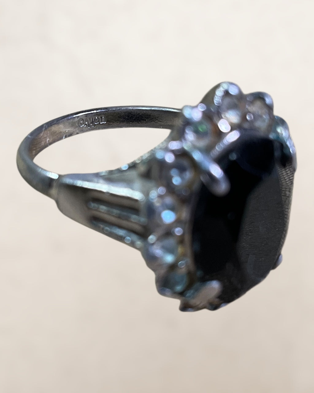 Vintage Avon Silver-tone Ring Featuring a Large Oval Black Stone Surrounded by 14 smaller White Rhinestones Estate Sale (Great Condition)