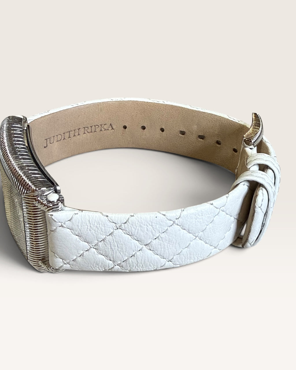 Judith Ripka Rectangular Cable-Edge Wristwatch Featuring a Textured Silver Dial with Stylized Oversized Arabic Numerals and a White Quilted Leather Strap