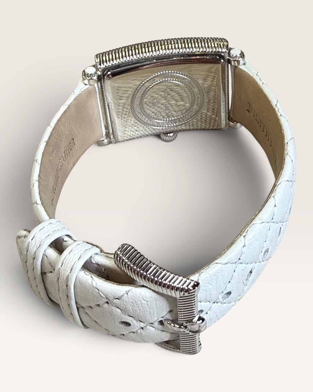 Judith Ripka Rectangular Cable-Edge Wristwatch Featuring a Textured Silver Dial with Stylized Oversized Arabic Numerals and a White Quilted Leather Strap