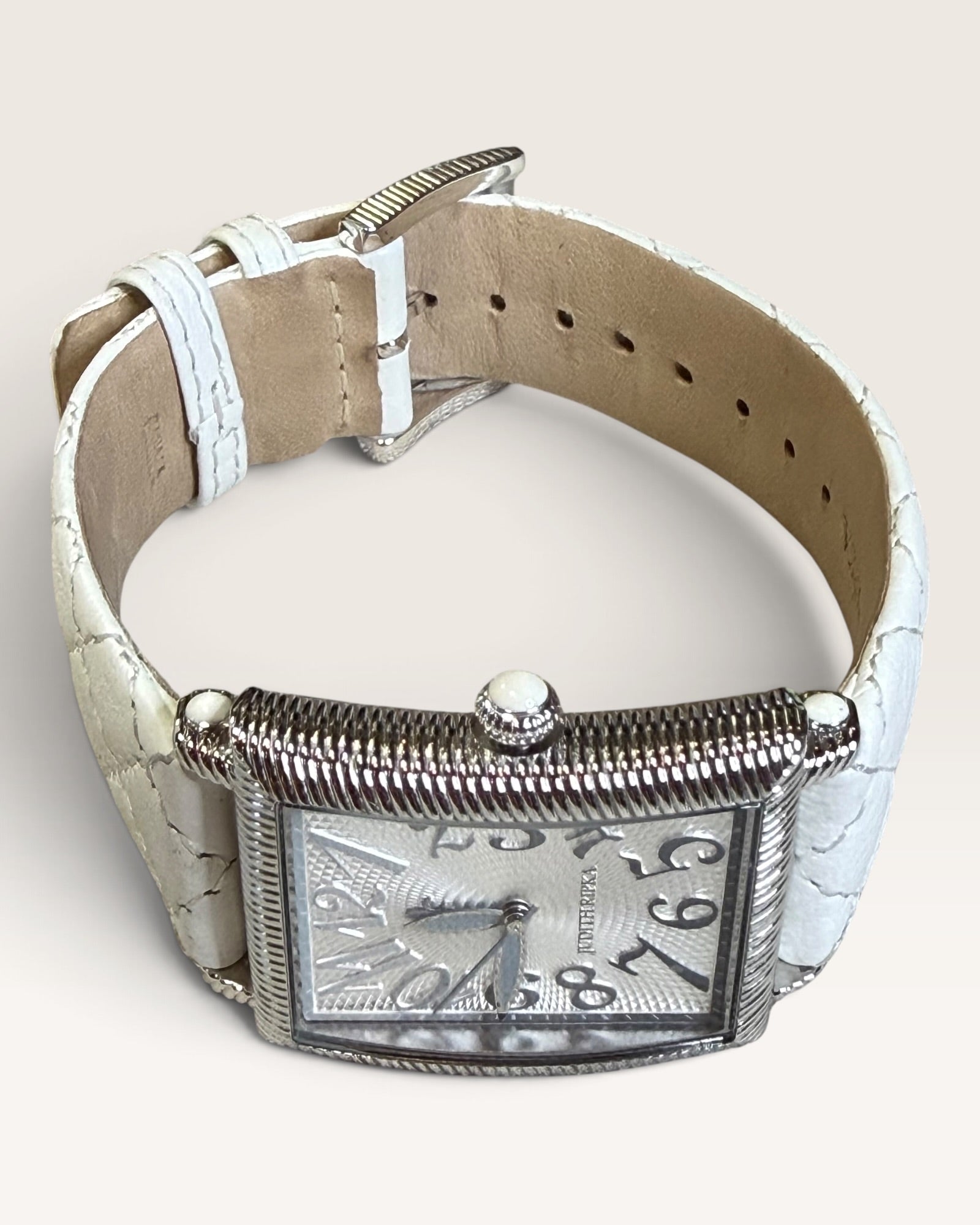 Judith Ripka Rectangular Cable-Edge Wristwatch Featuring a Textured Silver Dial with Stylized Oversized Arabic Numerals and a White Quilted Leather Strap