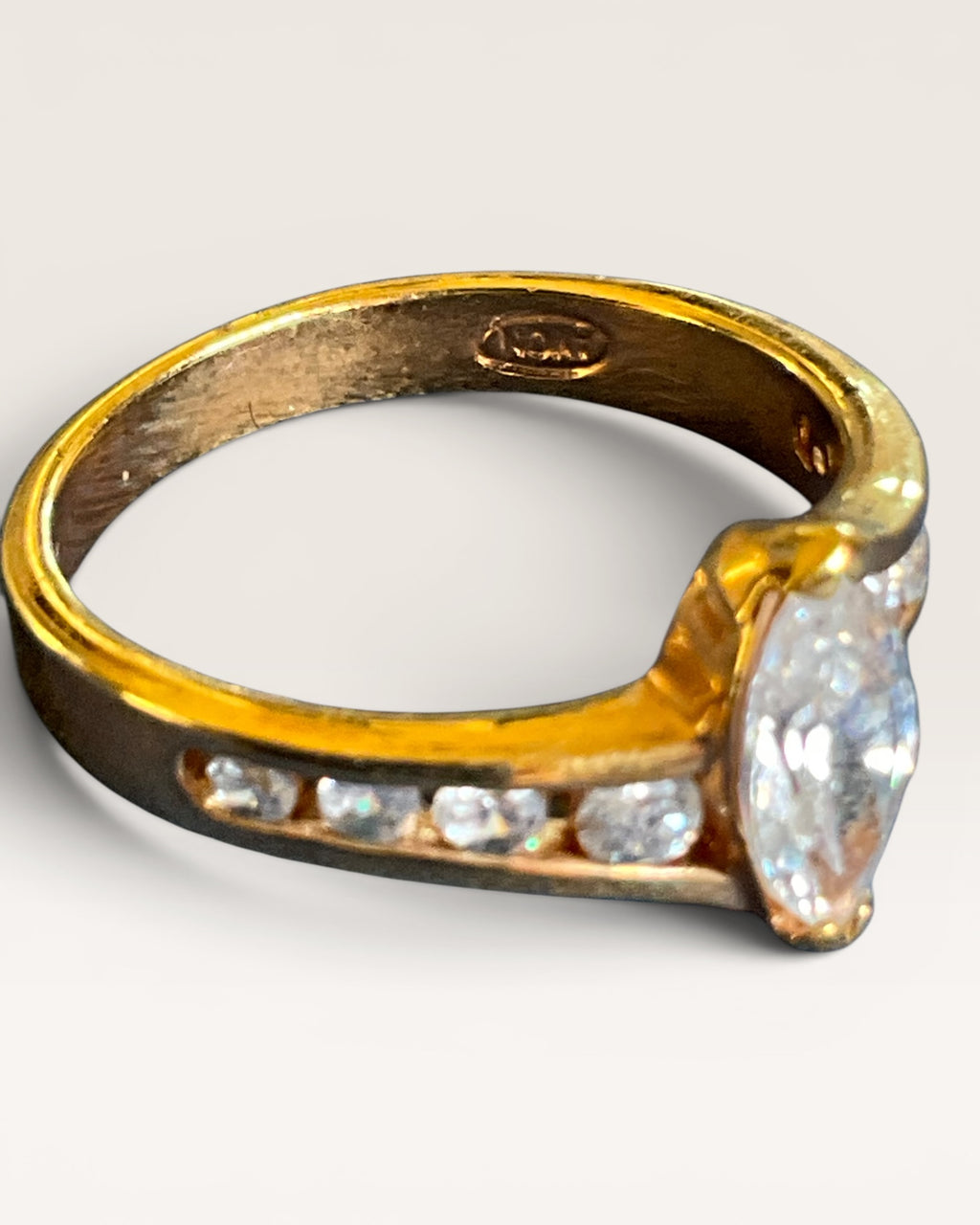 Vintage Avon Marquis Cut Center Stone Set in Gold Tone with Channel Set Cubic Zirconia Accents Ring - Estate Sale (Great Condition)