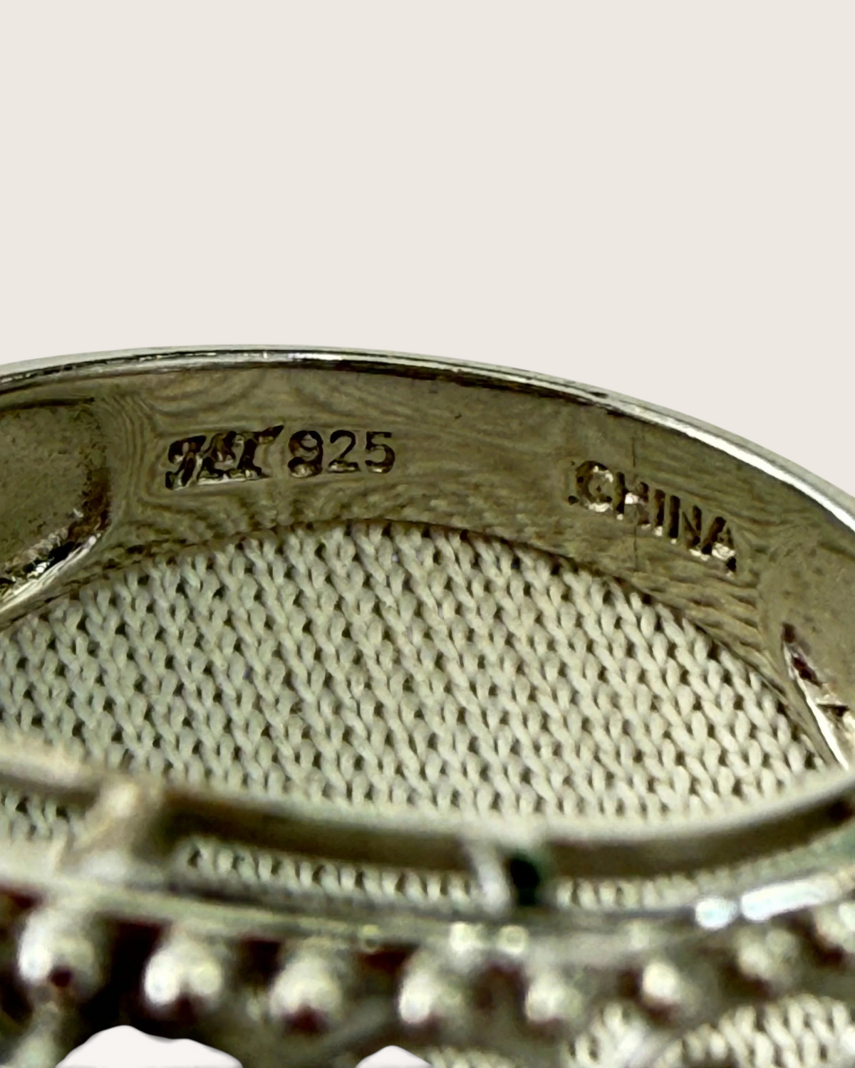 Cavallaro Creations sterling silver ring interior showing 925 hallmark and China origin stamp