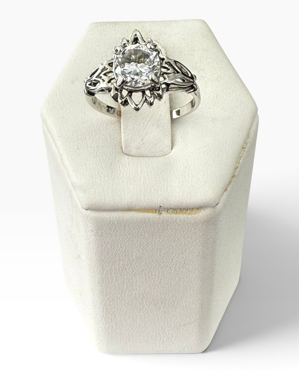 Cavallaro Creations sterling silver ring with a round-cut clear stone and intricate vintage filigree setting.