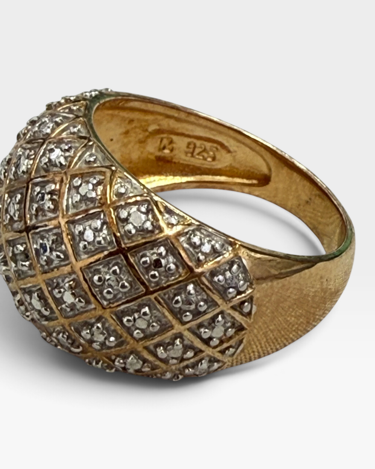 Cavallaro Creations gold-toned dome ring featuring a diamond lattice pattern with shimmering stone accents.