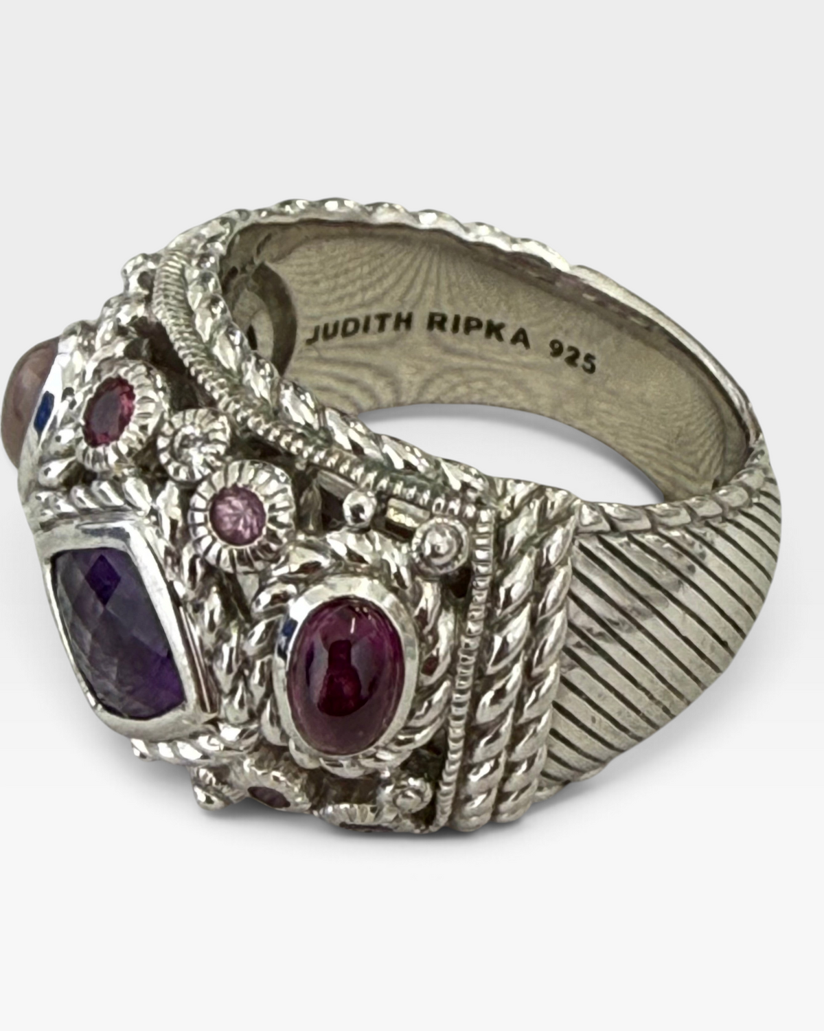 Cavallaro Creations Judith Ripka sterling silver statement ring with amethyst, berry gemstones, and rope-textured band.