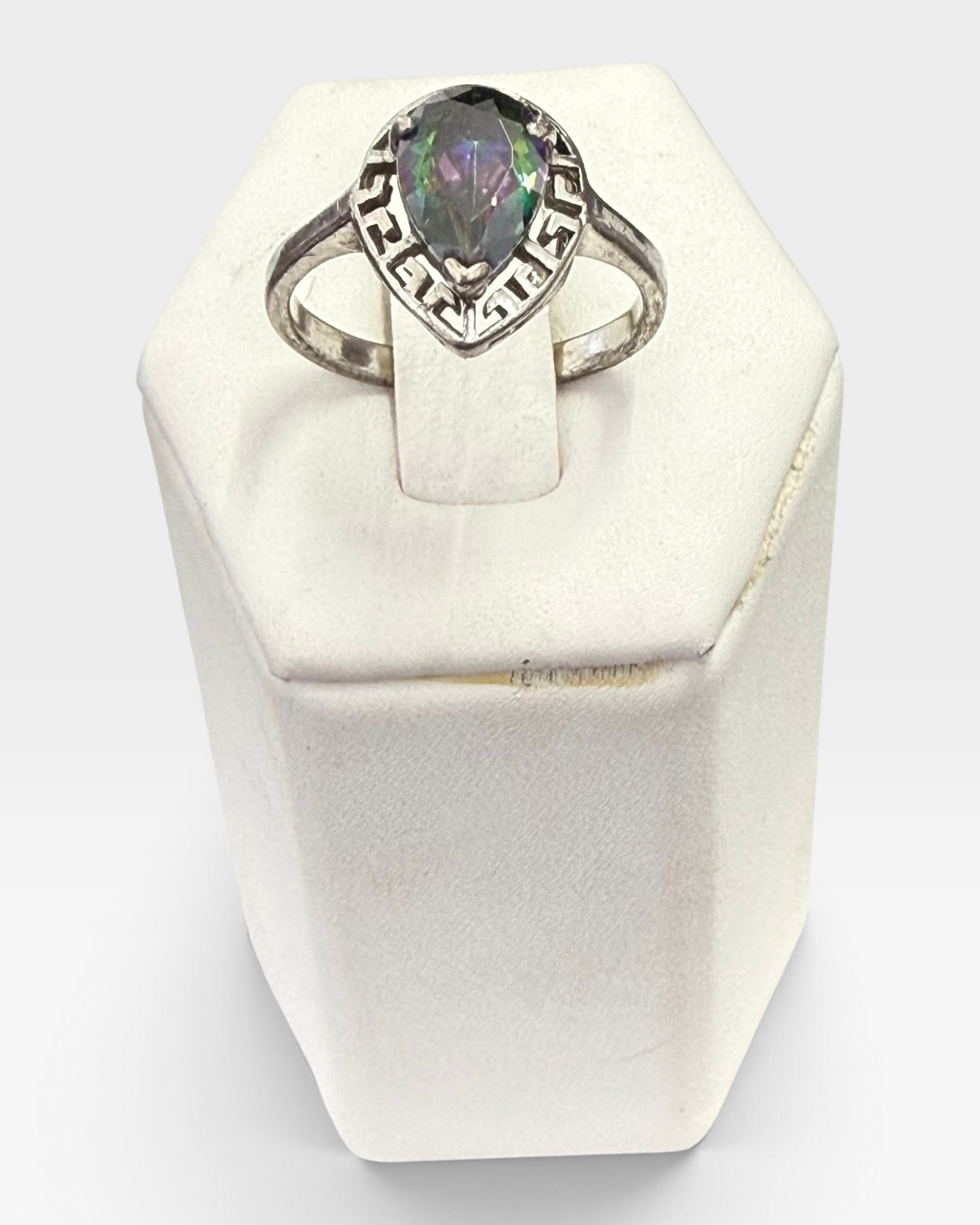 Cavallaro Creations sterling silver ring with a pear-cut iridescent mystic topaz and intricate Greek key design.
