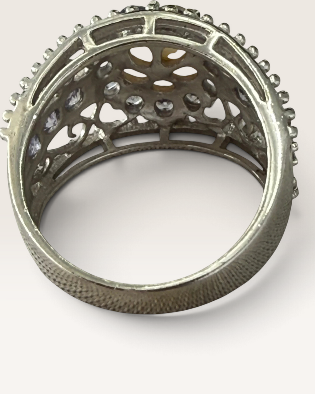 Cavallaro Creations sterling silver ring featuring intricate filigree metalwork and a central pearl with accent stones.