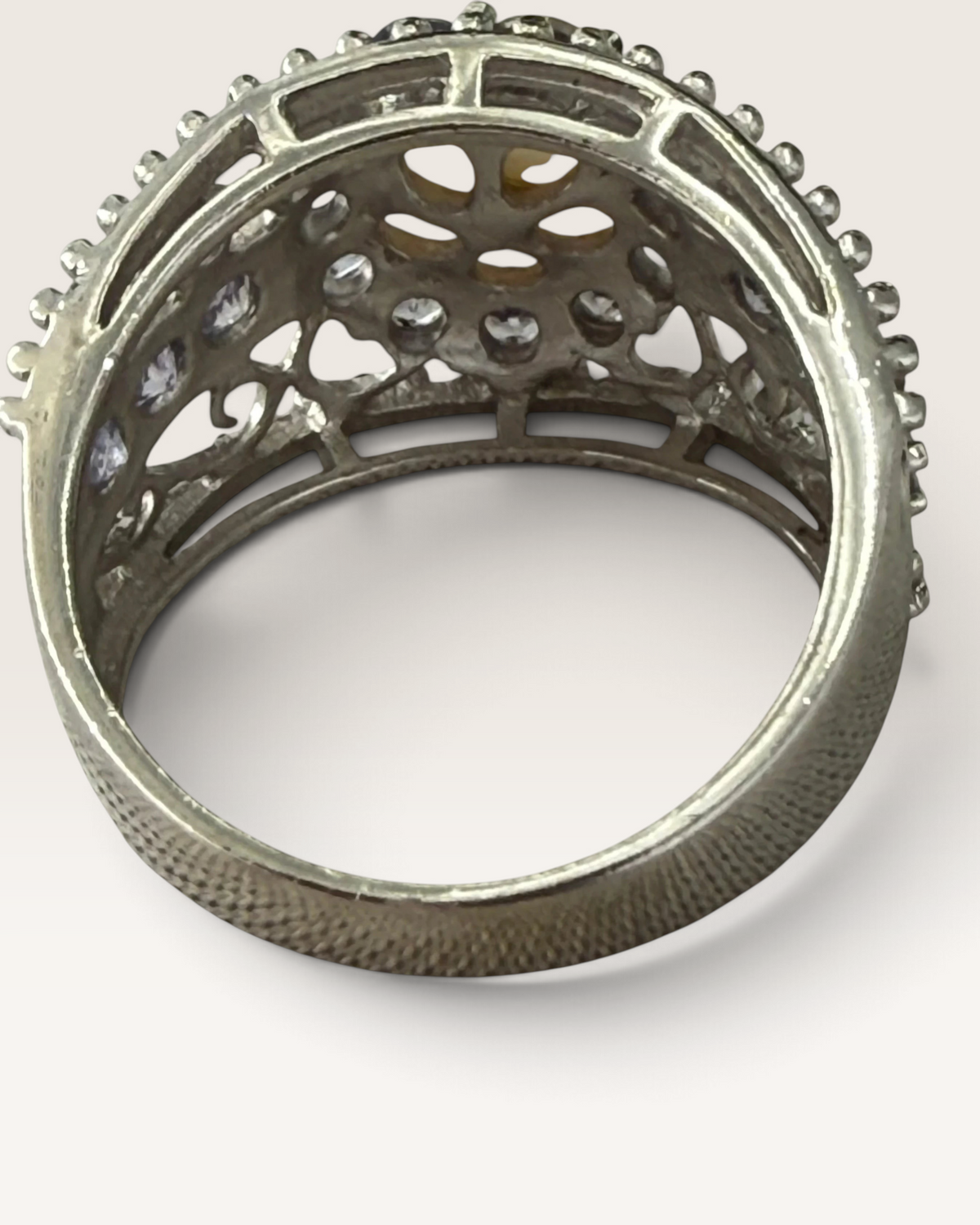 Cavallaro Creations sterling silver ring featuring intricate filigree metalwork and a central pearl with accent stones.