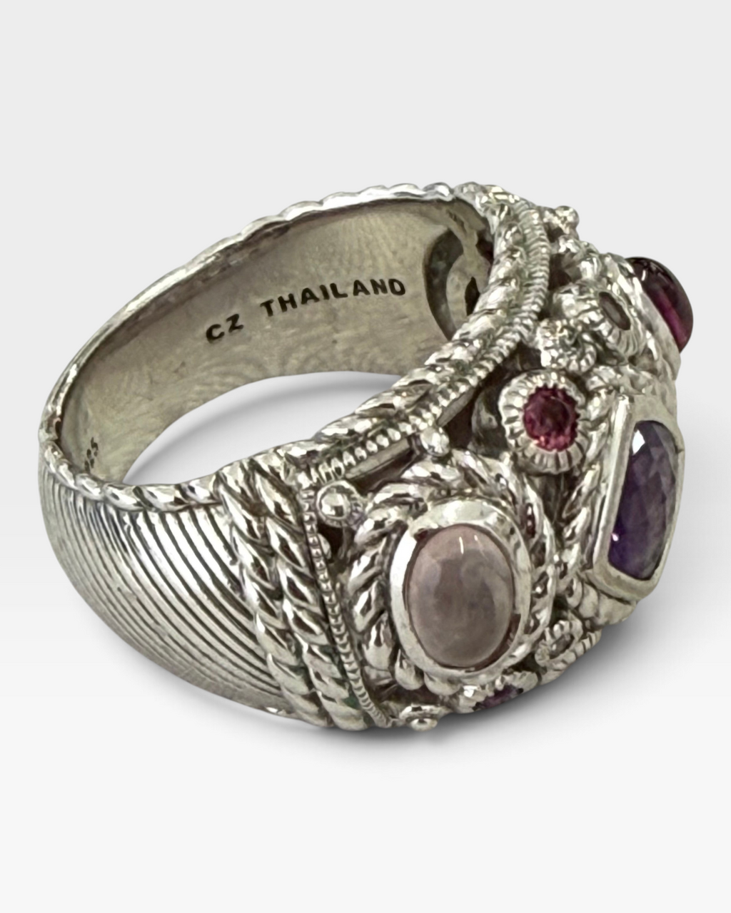 Cavallaro Creations sterling silver statement ring with rope texture, amethyst, and multi-colored gemstone accents.